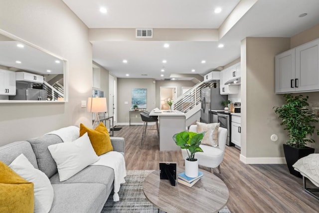 living room with hardwood / wood-style flooring