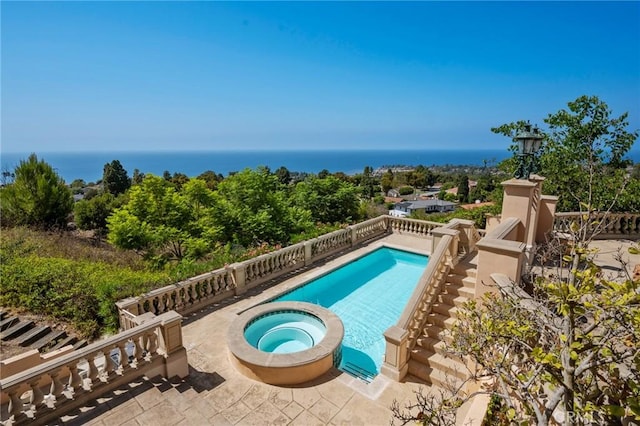 2736 Via Victoria, Palos Verdes Estates, CA 90274 - view of swimming pool featuring a pool with connected hot tub, a water view, and a patio