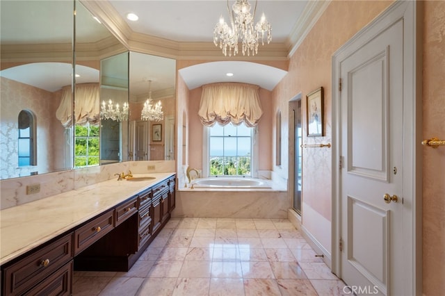 bathroom with crown molding, vanity, an inviting chandelier, and a wealth of natural light