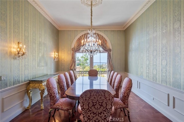 2736 Via Victoria, Palos Verdes Estates, CA 90274 - dining room featuring a notable chandelier, wallpapered walls, a decorative wall, and wainscoting
