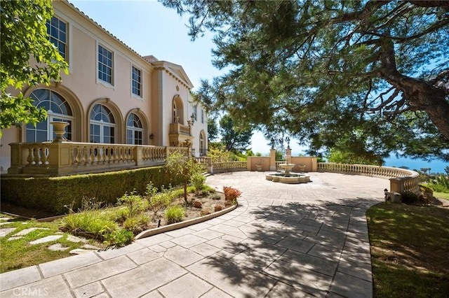 2736 Via Victoria, Palos Verdes Estates, CA 90274 - view of side of home with a patio area, stucco siding, and fence