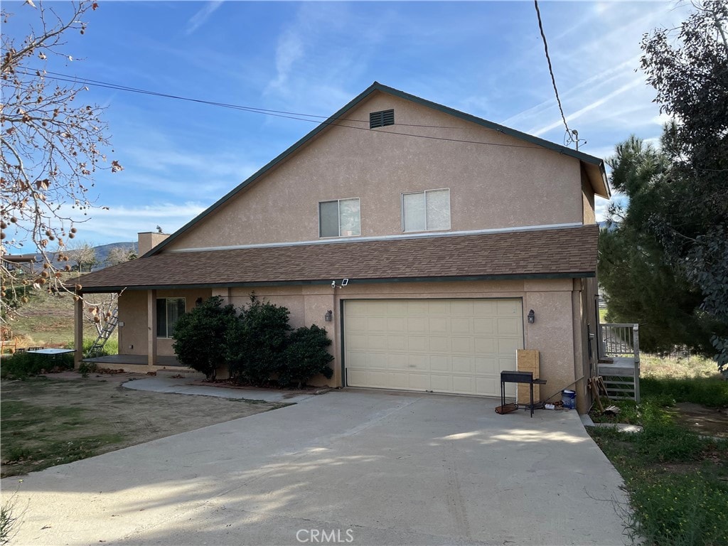 exterior space with a garage