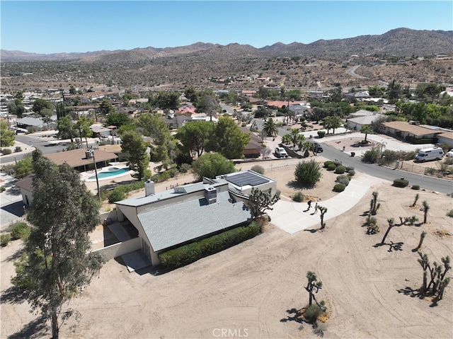 bird's eye view with a mountain view