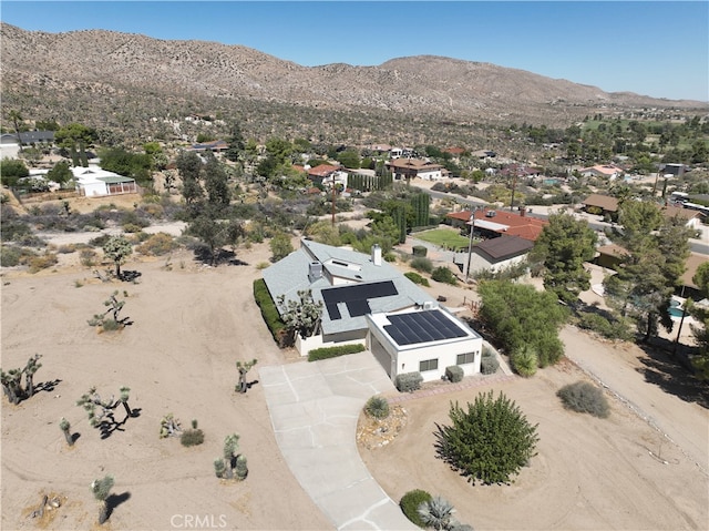 bird's eye view with a mountain view