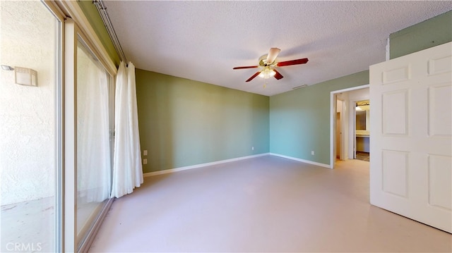 unfurnished bedroom with a textured ceiling and ceiling fan