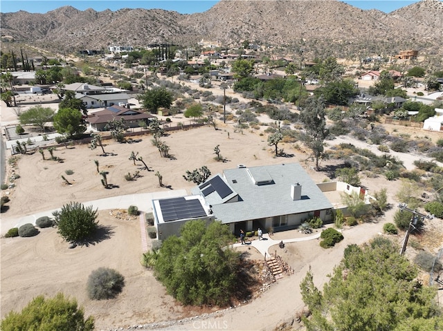 drone / aerial view featuring a mountain view