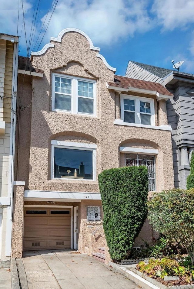 view of front of home featuring a garage