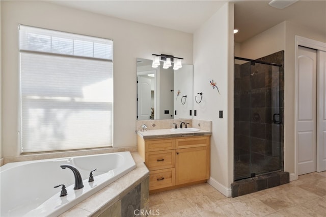 bathroom featuring vanity and plus walk in shower