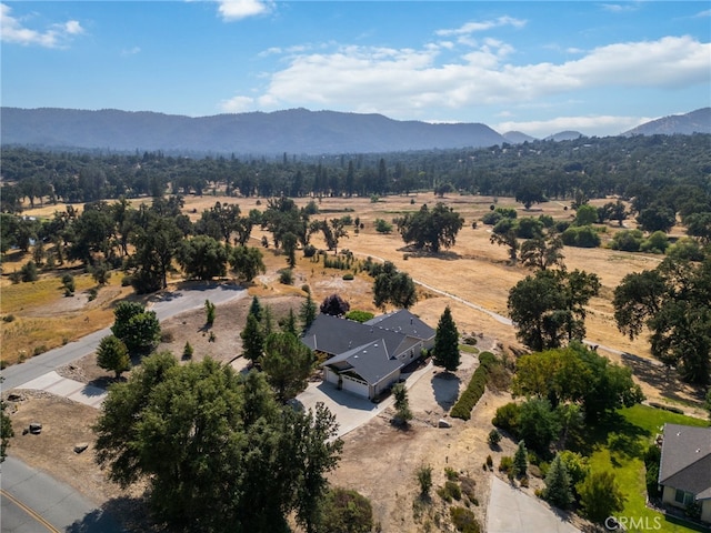 bird's eye view featuring a rural view and a mountain view