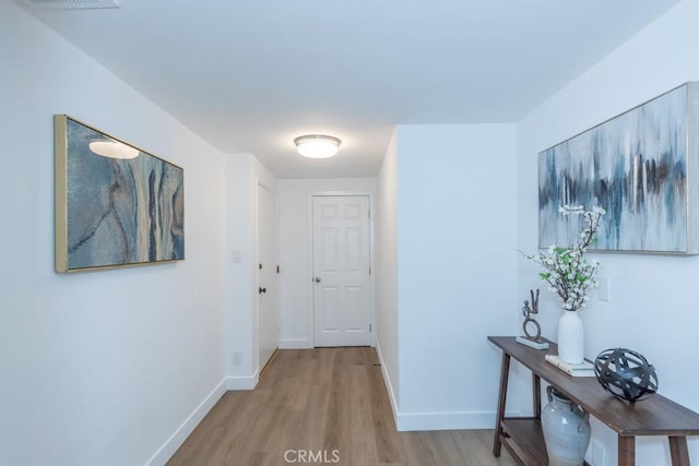 hall featuring light wood-type flooring