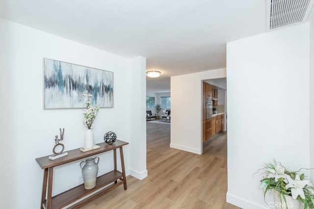 hall featuring light hardwood / wood-style floors