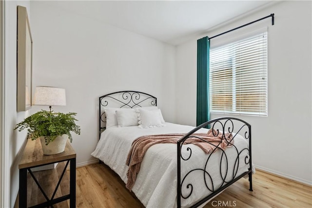 bedroom featuring light hardwood / wood-style flooring