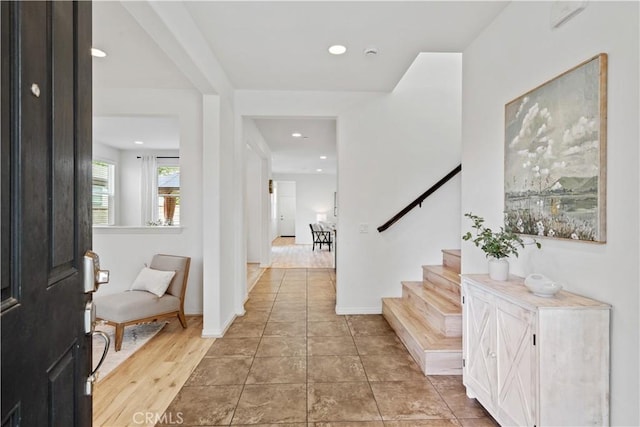 entryway with light hardwood / wood-style flooring