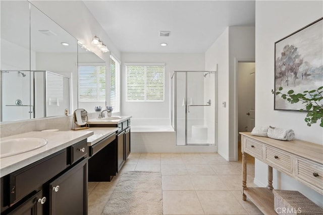 bathroom featuring vanity, tile patterned floors, and independent shower and bath