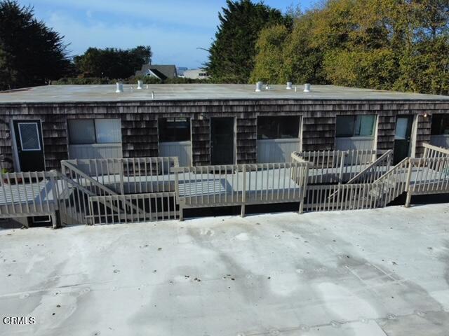 view of front of house with a wooden deck