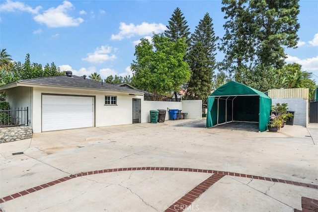 exterior space with a carport