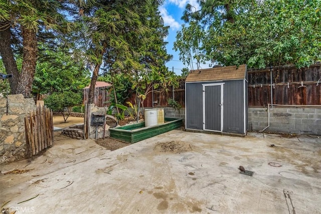 view of patio / terrace with a storage unit