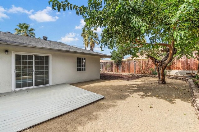 view of yard with a wooden deck