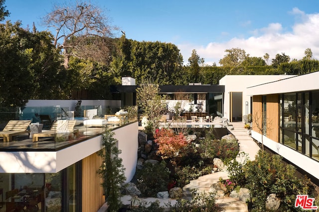 back of house with a patio area