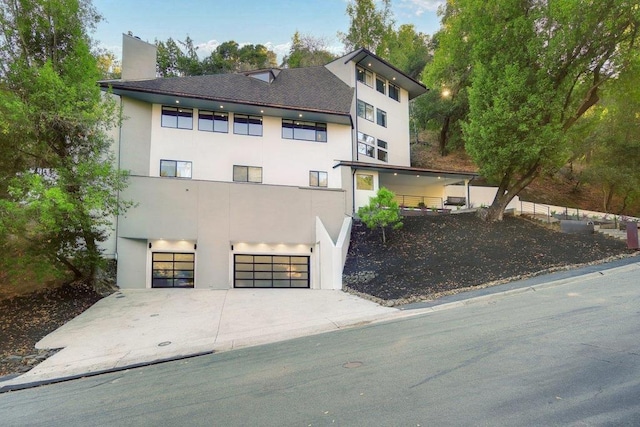 modern home featuring a garage