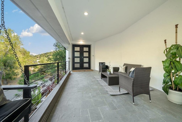 balcony with an outdoor hangout area