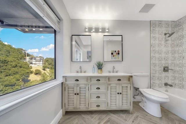 full bathroom featuring shower / bathing tub combination, vanity, toilet, and parquet floors