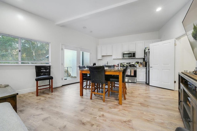 dining room featuring light hardwood / wood-style floors