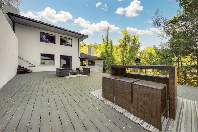 deck featuring an outdoor hangout area