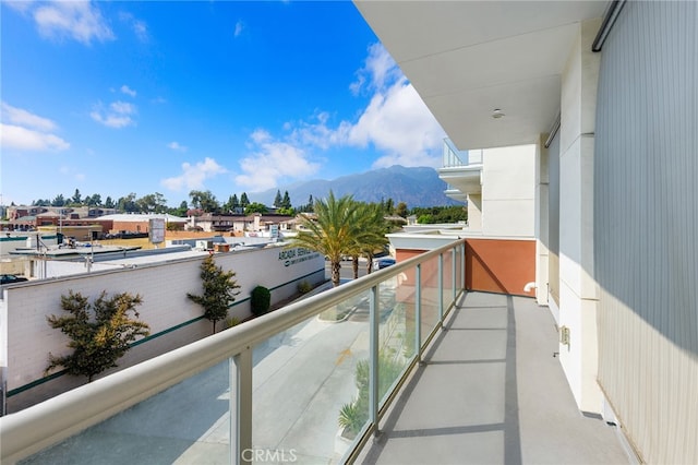 balcony featuring a mountain view