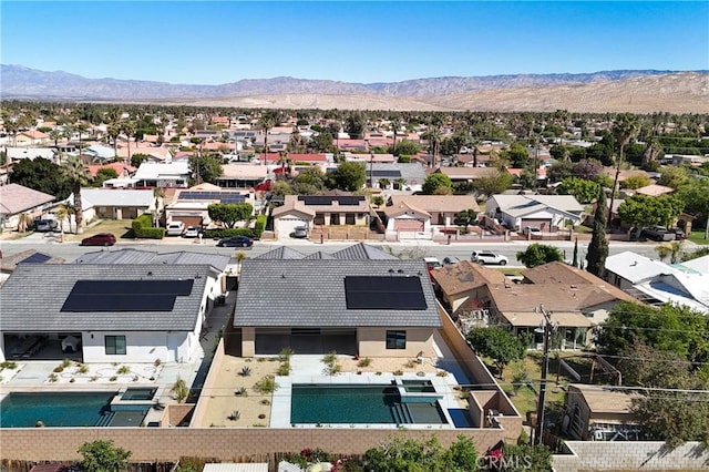 drone / aerial view featuring a mountain view