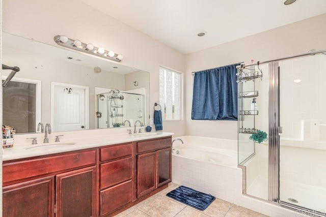 bathroom featuring tile patterned floors, vanity, and independent shower and bath