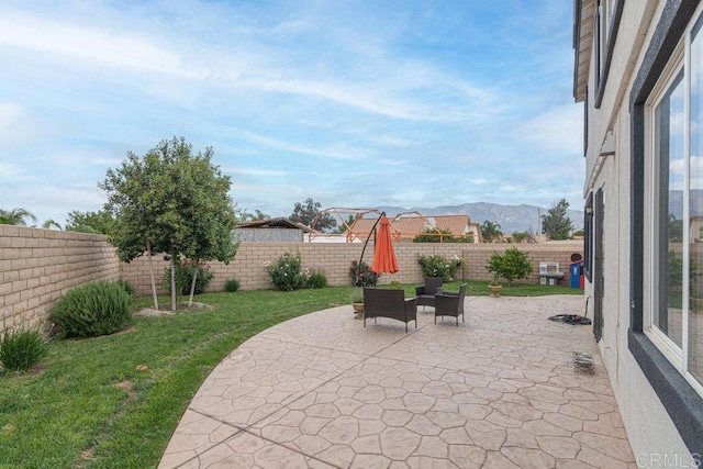 view of patio with a mountain view