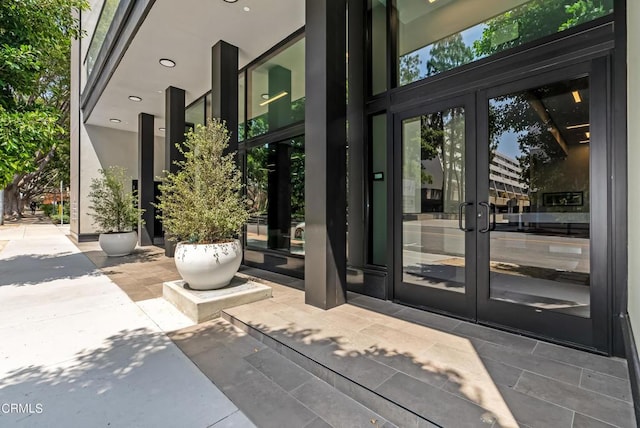 property entrance featuring french doors