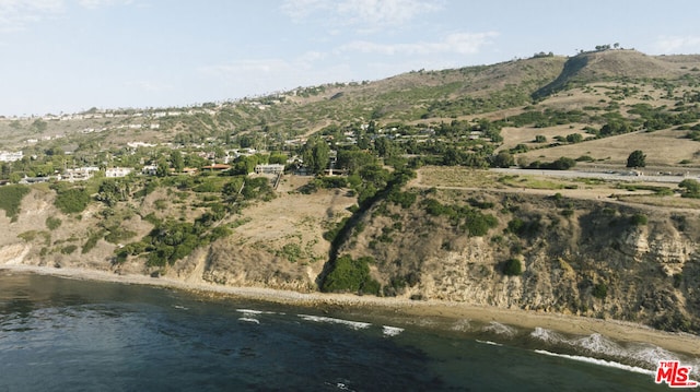 view of mountain feature featuring a water view