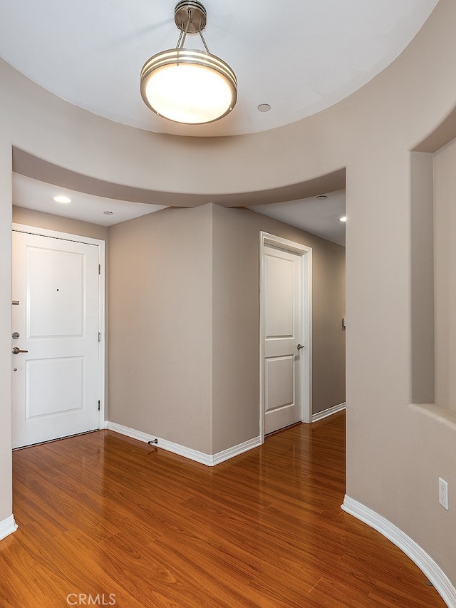 empty room featuring hardwood / wood-style floors