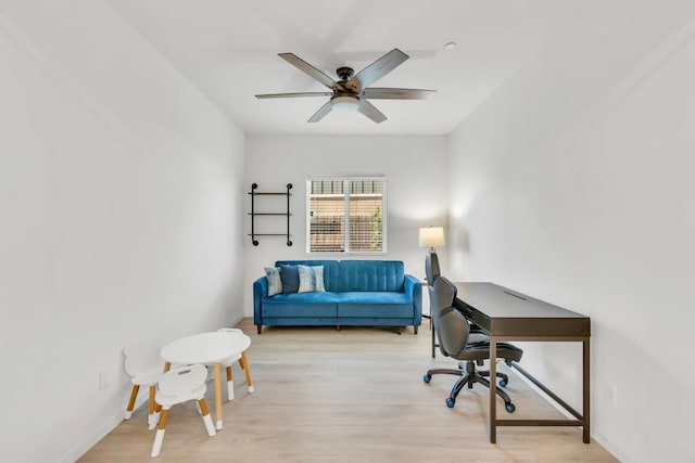 office featuring ceiling fan and light hardwood / wood-style floors