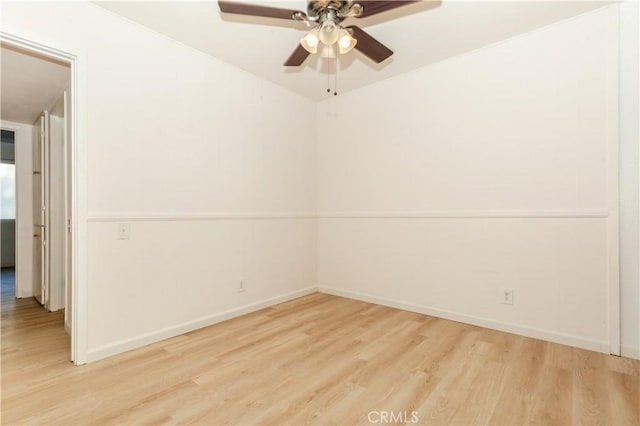 unfurnished room with ceiling fan and light hardwood / wood-style floors