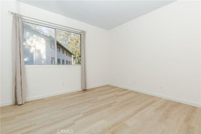 empty room featuring light hardwood / wood-style floors