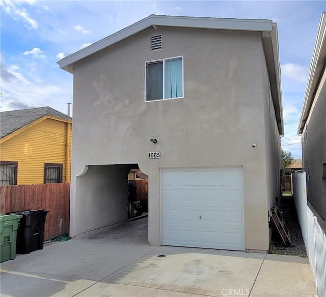 exterior space featuring a garage