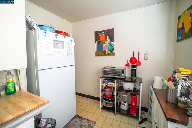 kitchen with white fridge