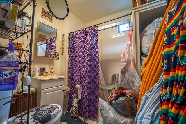 bathroom with vanity and toilet