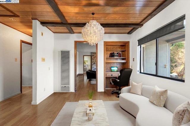 living room with wood ceiling, light hardwood / wood-style floors, and a chandelier