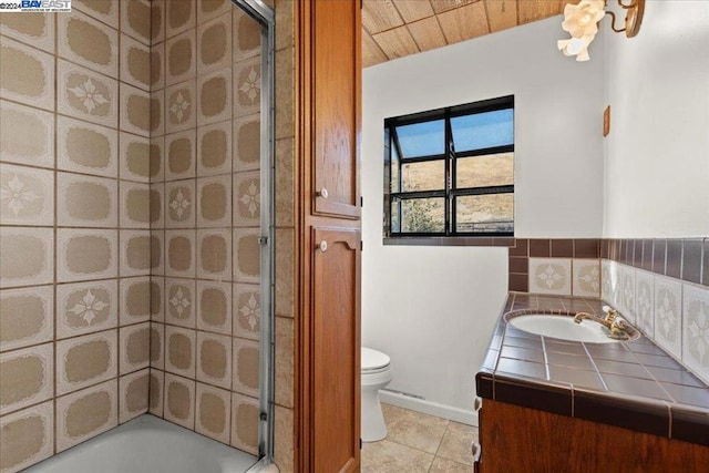 full bathroom featuring wood ceiling, tile patterned flooring, vanity, enclosed tub / shower combo, and toilet