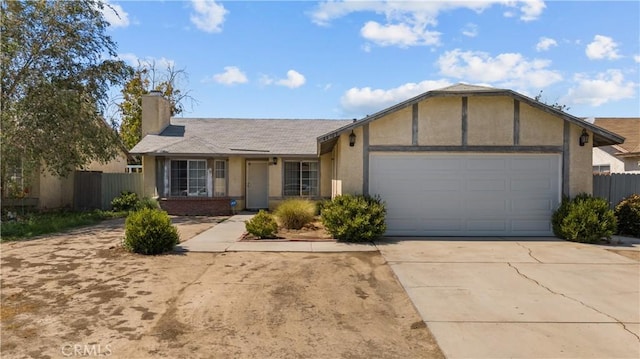 ranch-style home featuring a garage