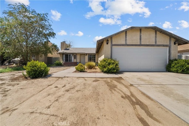 single story home featuring a garage