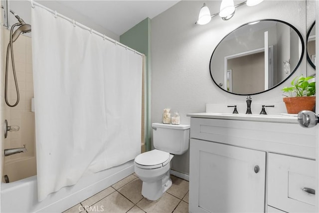 full bathroom featuring tile patterned flooring, shower / bath combination with curtain, vanity, and toilet