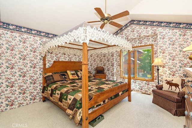 bedroom featuring carpet, vaulted ceiling, and ceiling fan