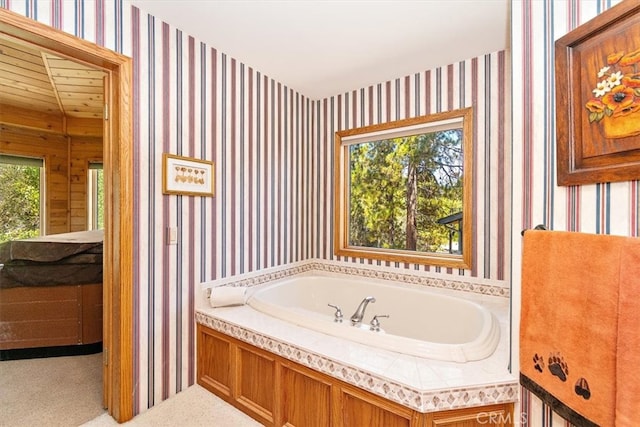 bathroom featuring a washtub