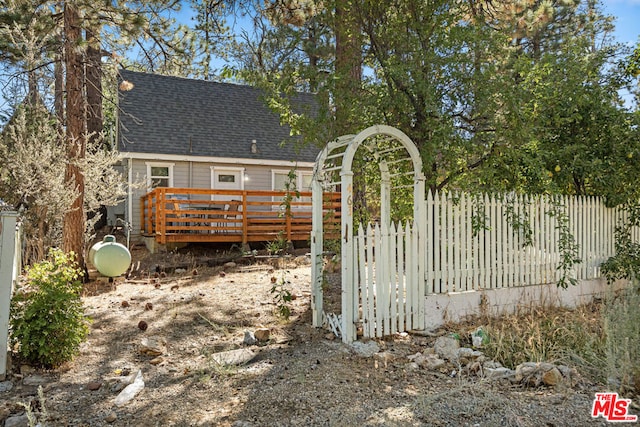 exterior space featuring a wooden deck