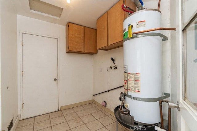 utility room featuring secured water heater